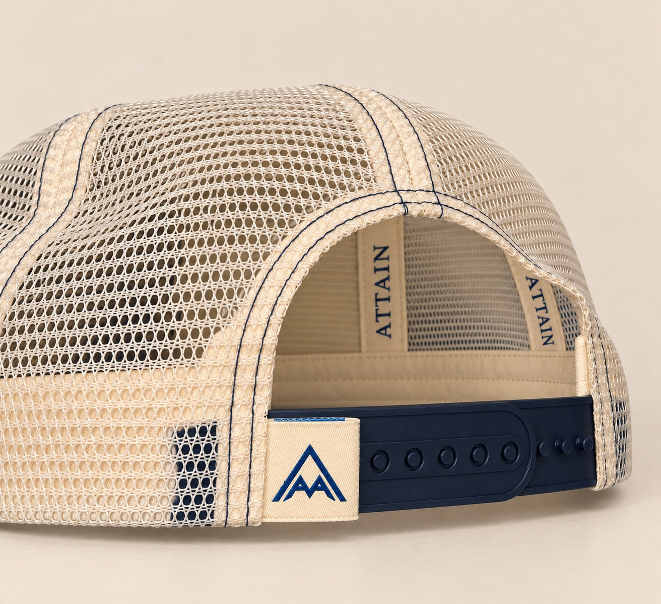 ATTAIN ATTIRE TRUCKER CAP